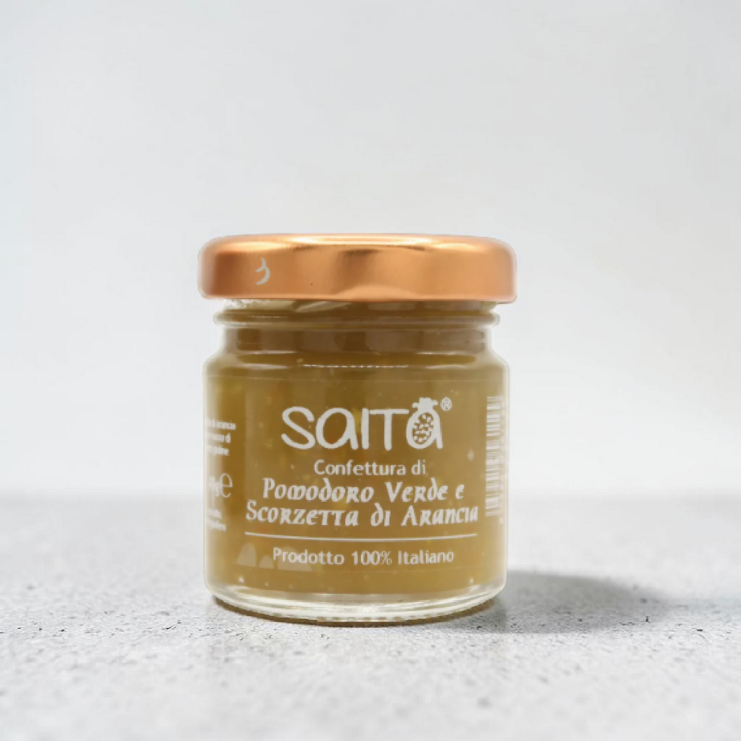 Jar of Saita confettura on a light gray background