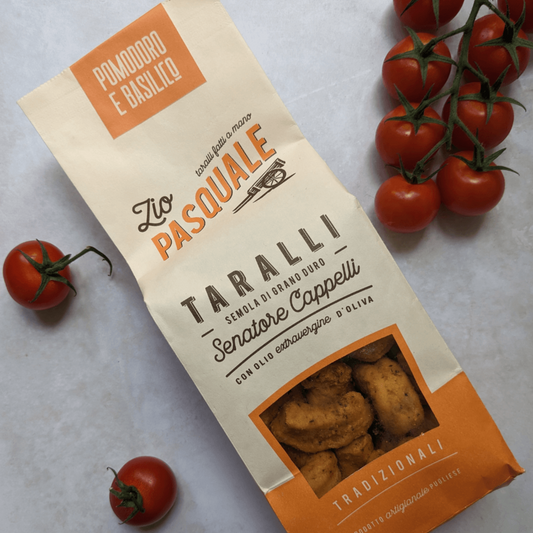 Zio Pasquale Taralli package with tomatoes on a light background