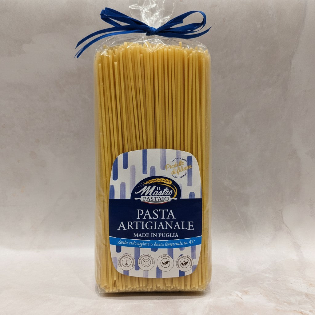 Packaged pasta with a blue ribbon on a light gray background