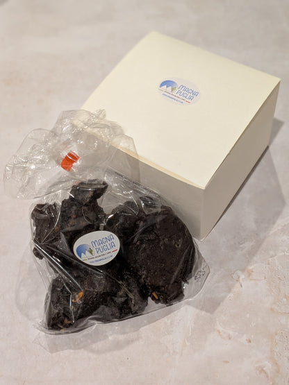 Packaged chocolate biscuits with a branded label on a white surface