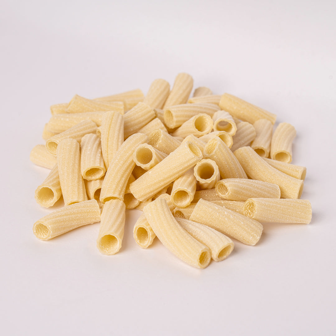 pasta torciglioni on a white background